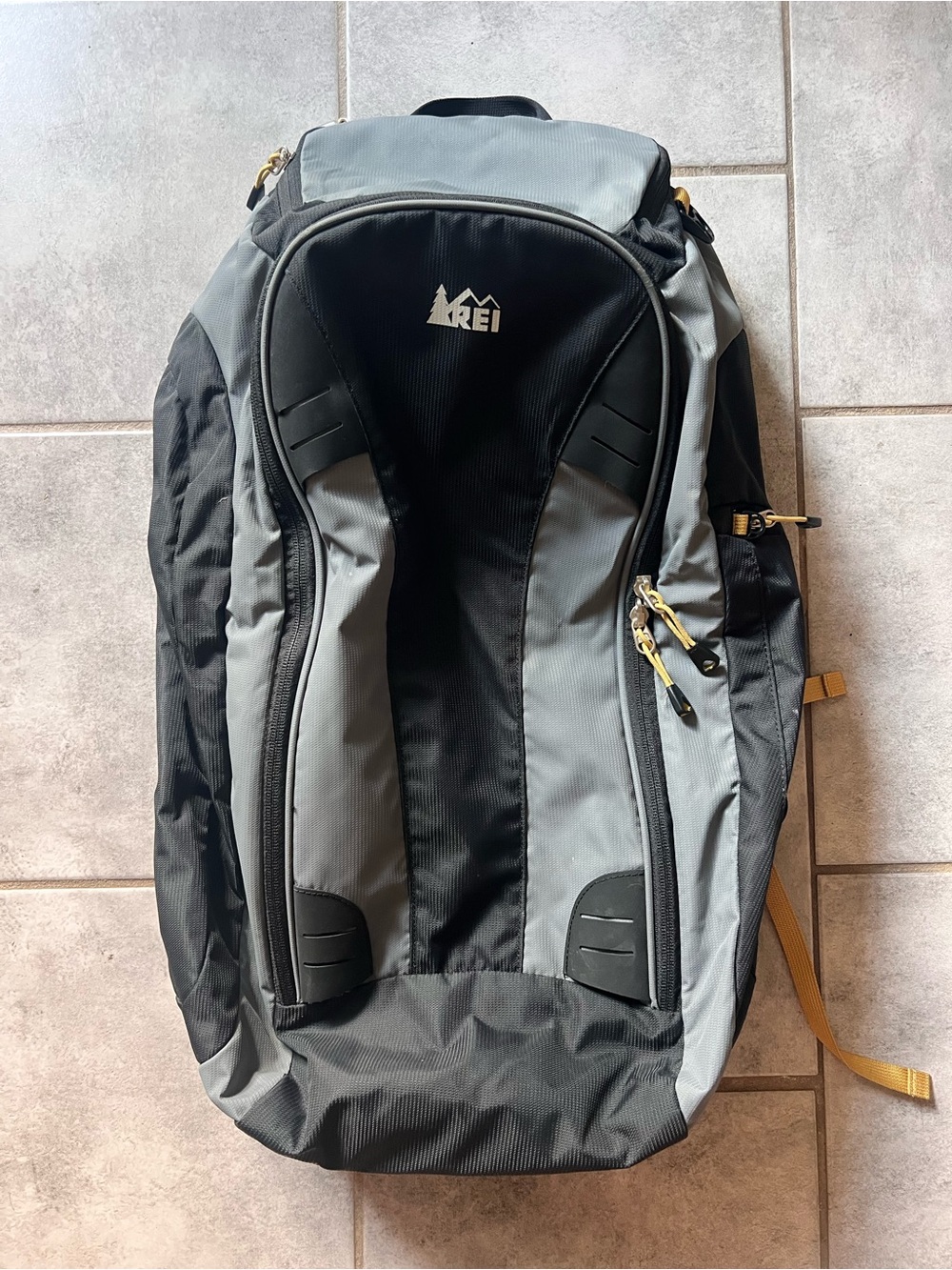 REI Men's Black and Gray Hiking Backpack with Gold Accents
